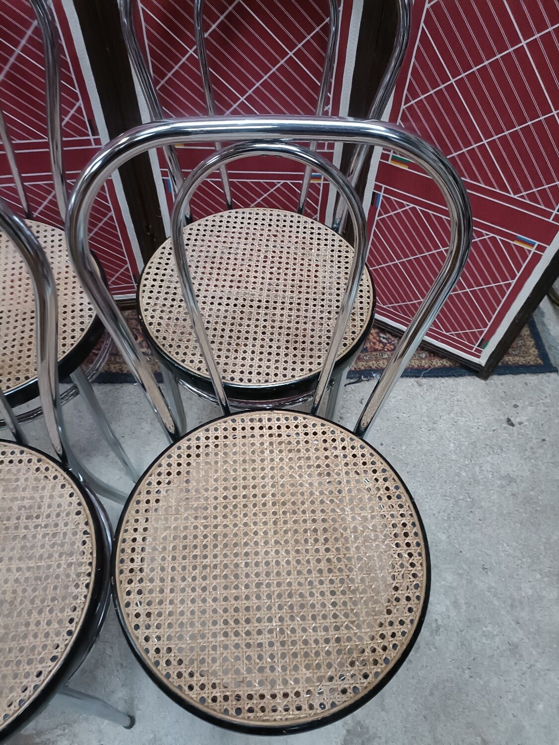 4 chaises bistrot en acier chromé et assise cannée