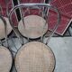 4 chaises bistrot en acier chromé et assise cannée