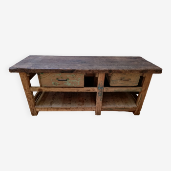 Old vintage wooden carpenter's workbench, industrial decoration