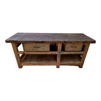 Old vintage wooden carpenter's workbench, industrial decoration