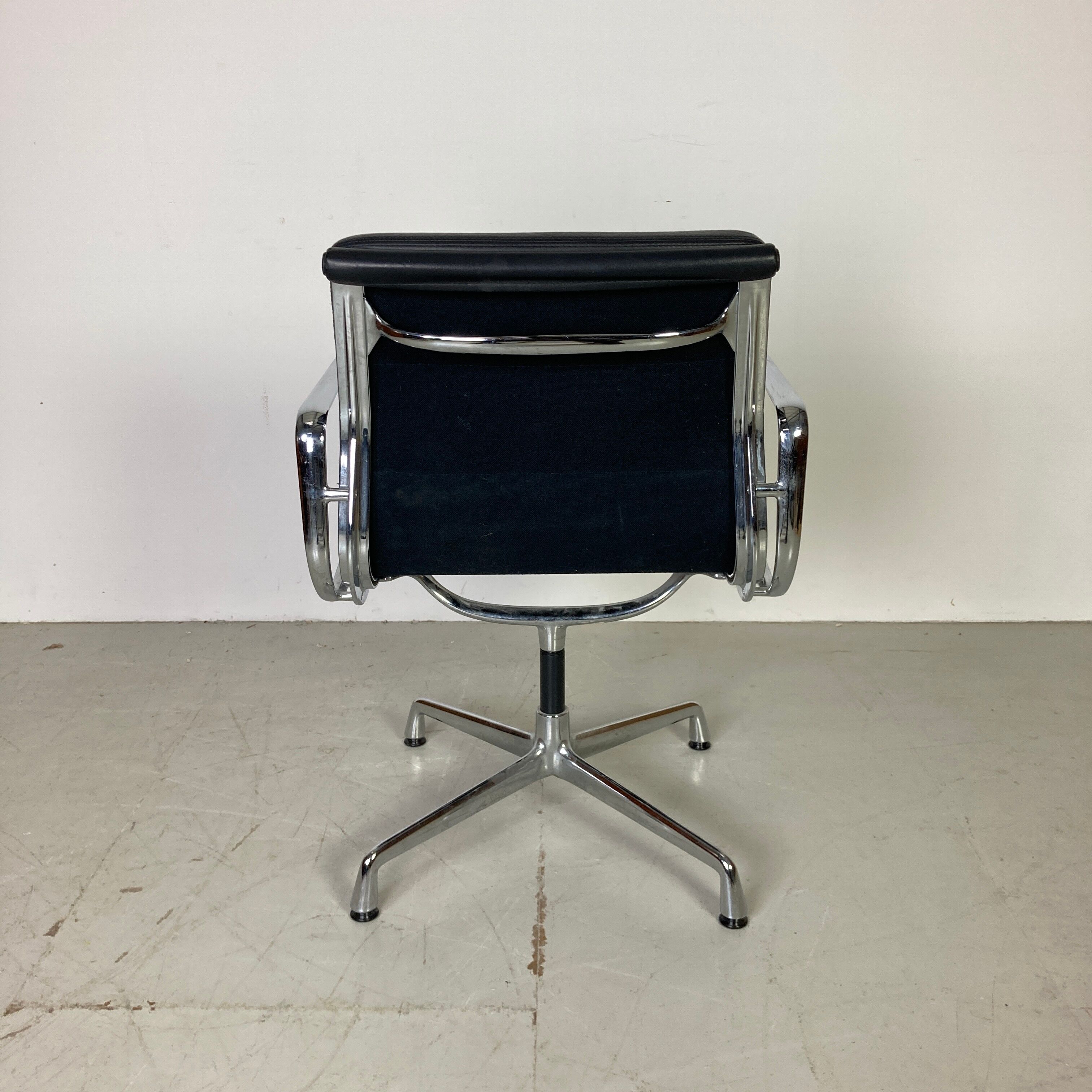 Eames black leather Soft Pad Group chair made by Vitra for Herman Miller