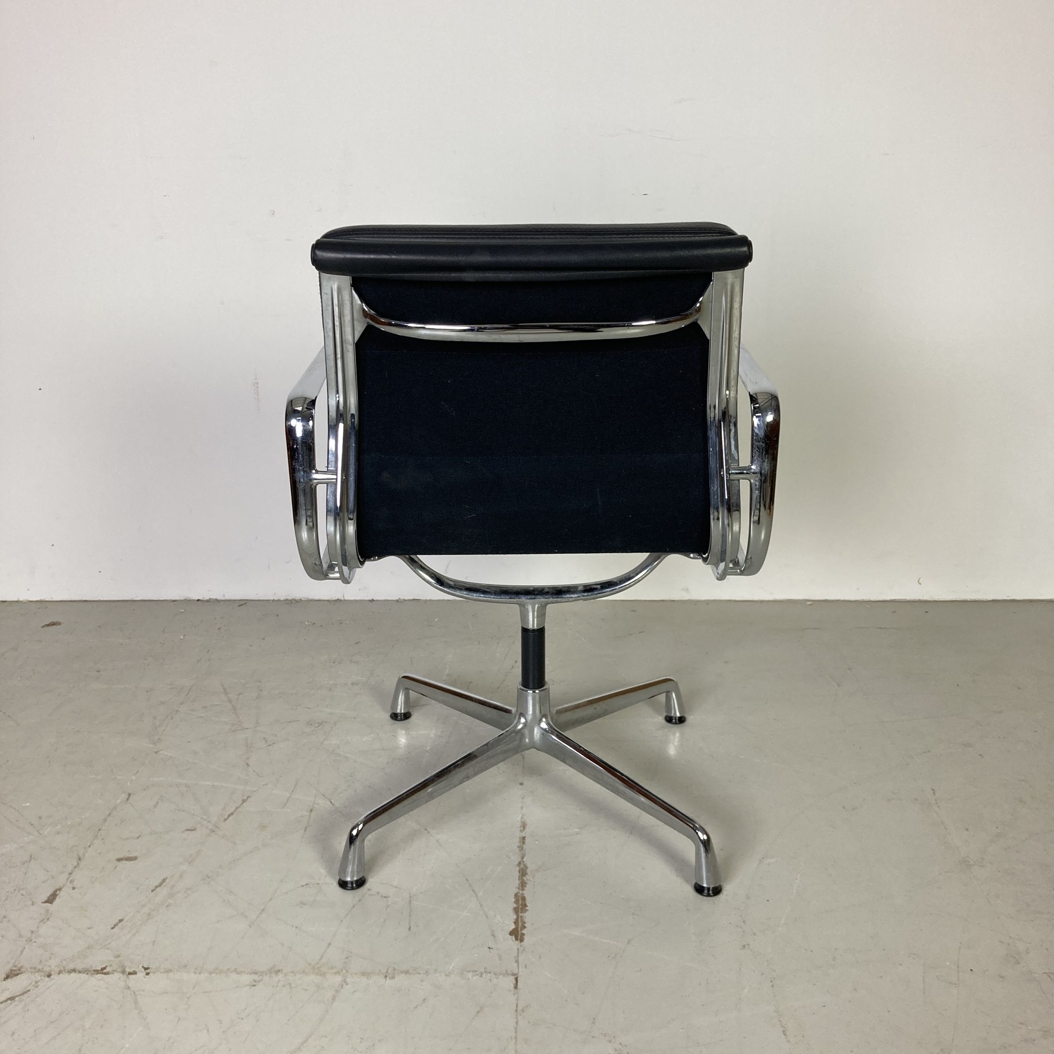 Eames black leather Soft Pad Group chair made by Vitra for Herman Miller