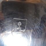 Silver-plated coffee and tea service including a coffee pot, a teapot, and a sugar bowl.