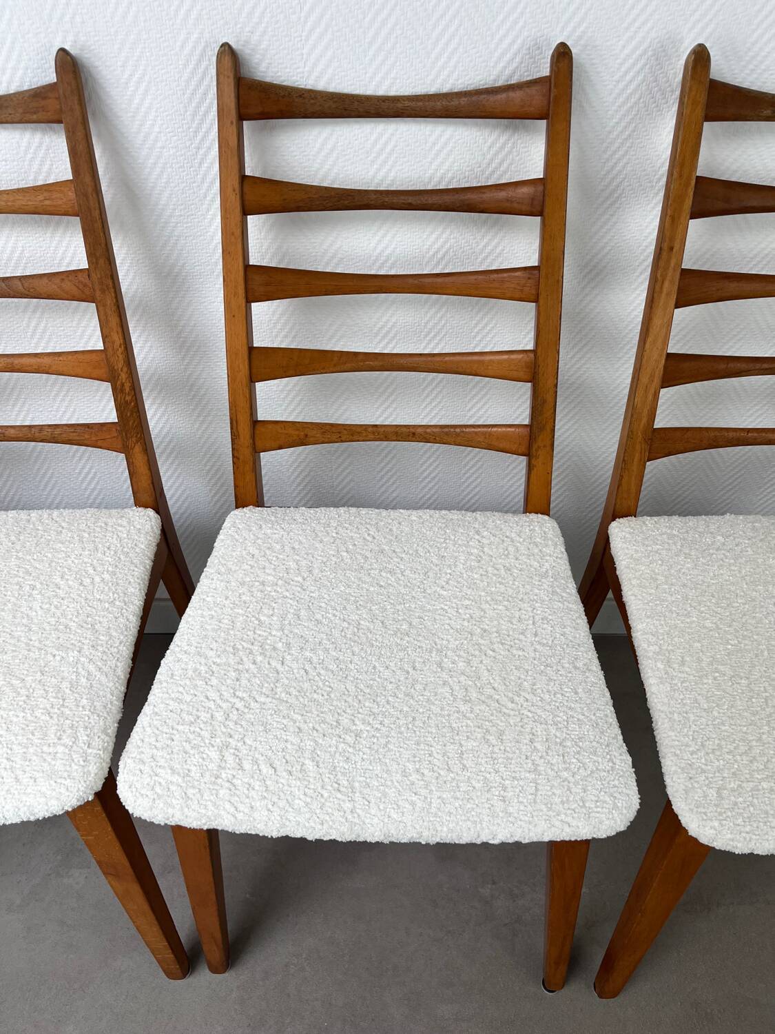 4 Scandinavian chairs, teak with boucle seats.