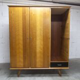 French wardrobe with tapered legs, 3 doors, 1 mirror (27*130), and 1 drawer.