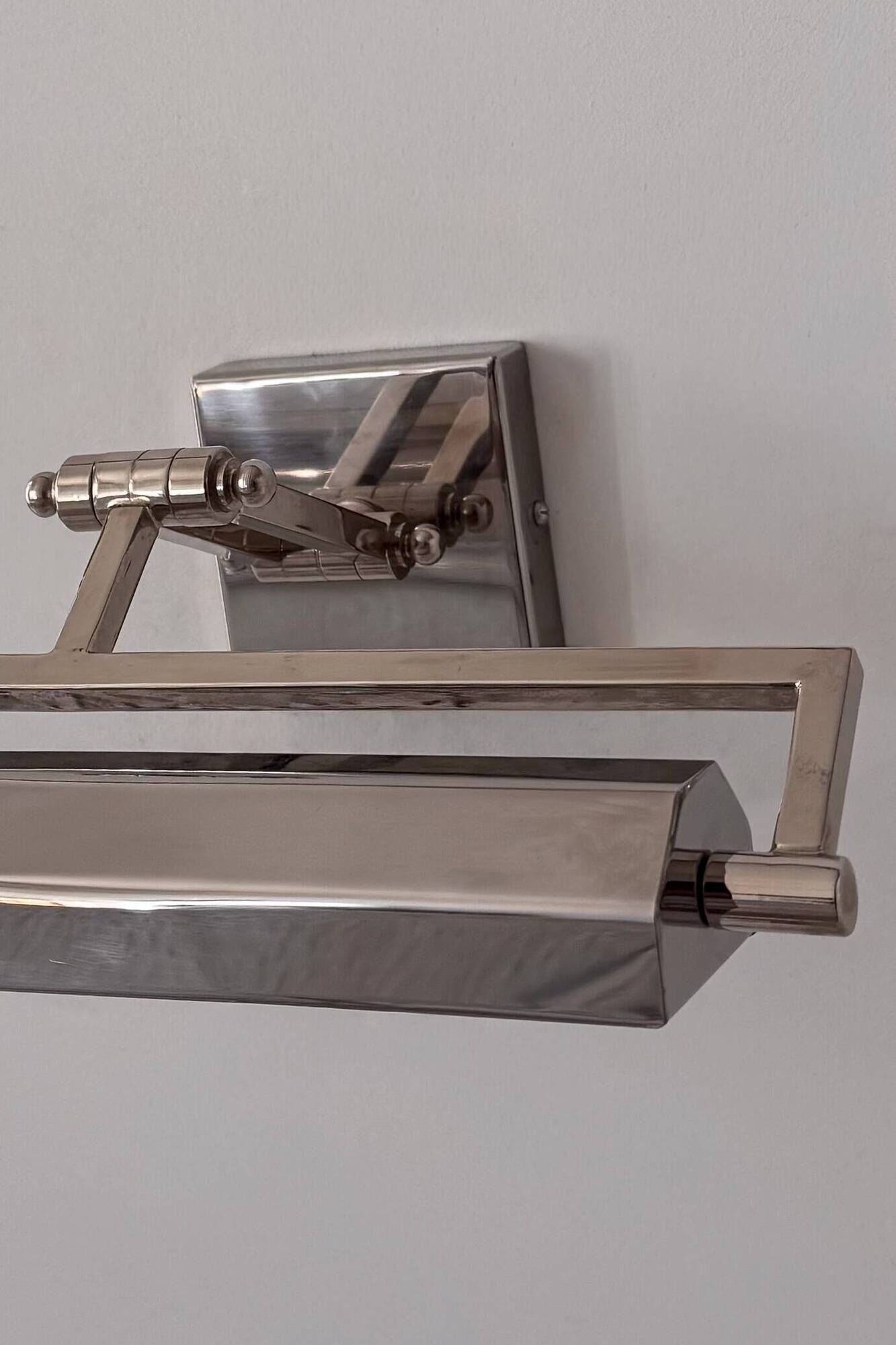 Pair of vintage geometric adjustable wall lights in chrome metal, France 70s.