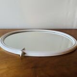 Oval mirror in vintage enameled white cast iron