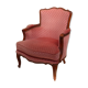 Fauteuil bergère vintage en velours rose.
