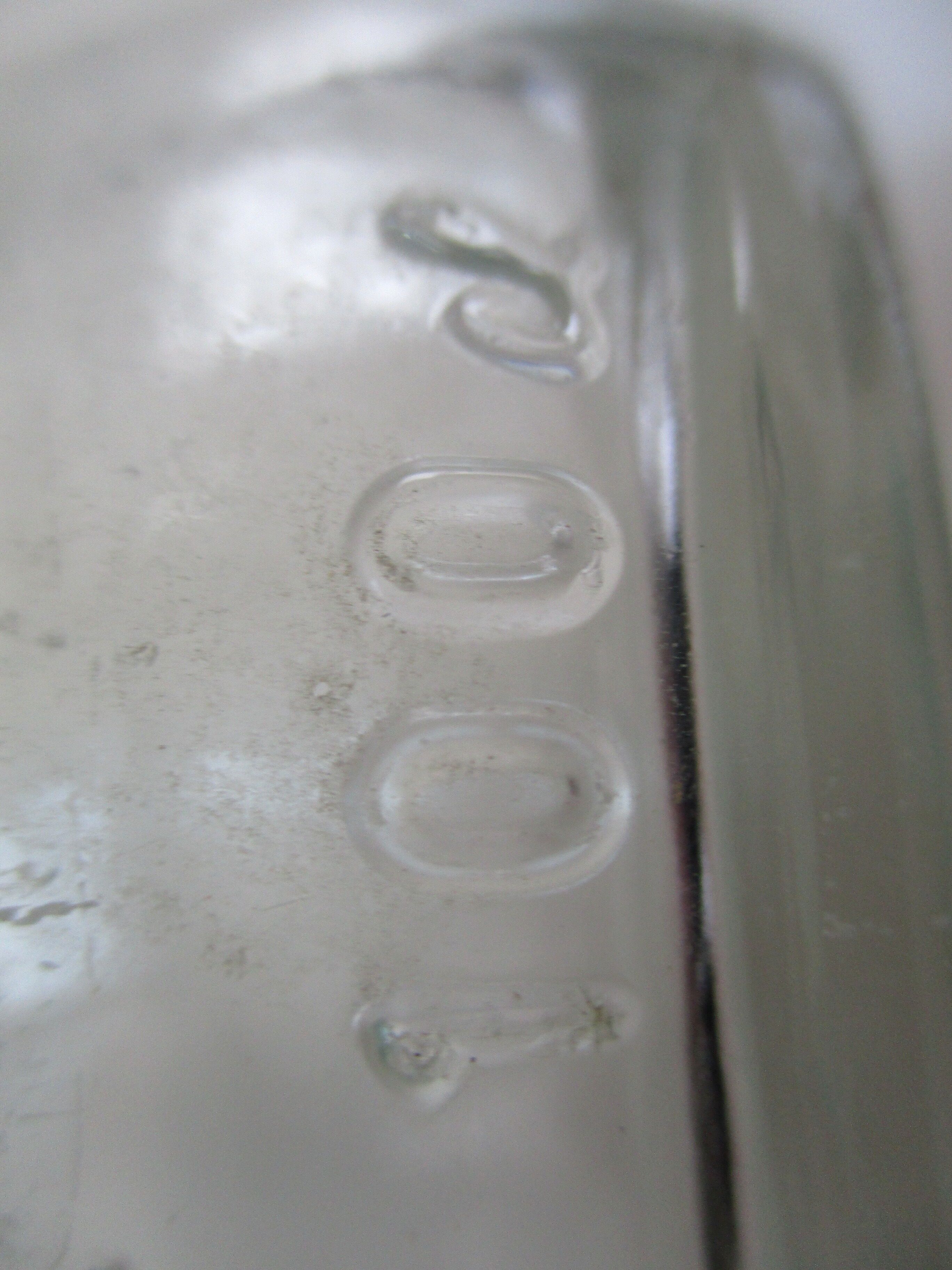 Vintage milk bottle in clear glass