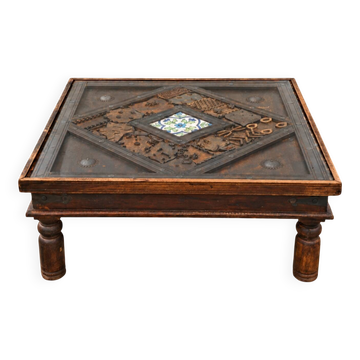 Large square vintage coffee table in wood, glass, and metal decor.