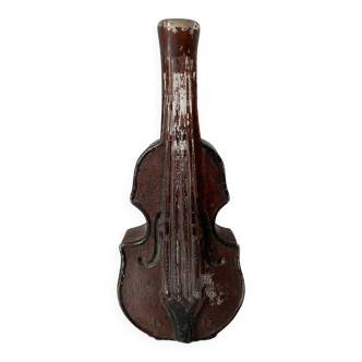 Violin shaped glass bottle