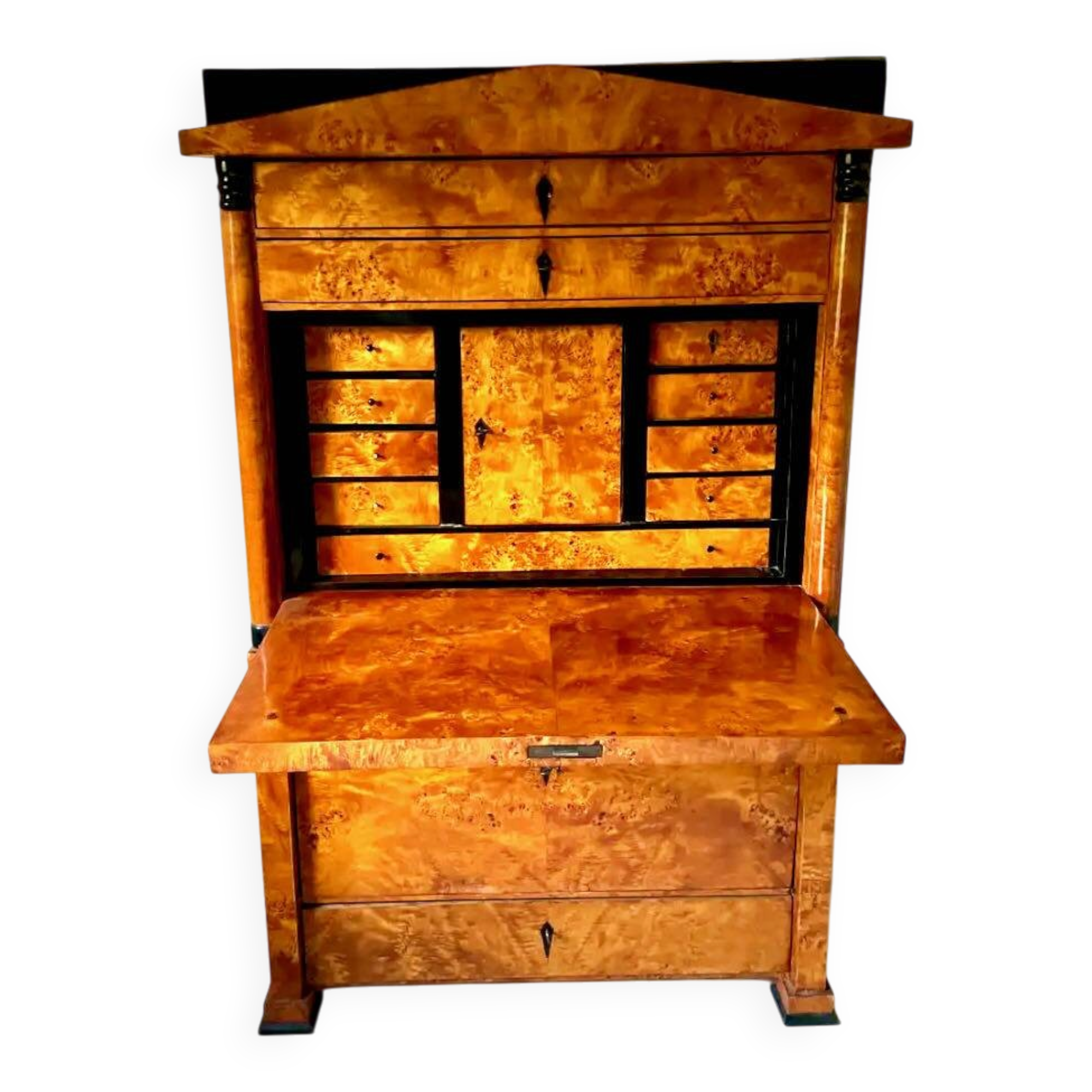 Secretary with a drop-leaf in pine and ebony, in Biedermeier style.
