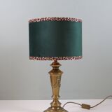 Vintage brass table lamp with green velvet shade.