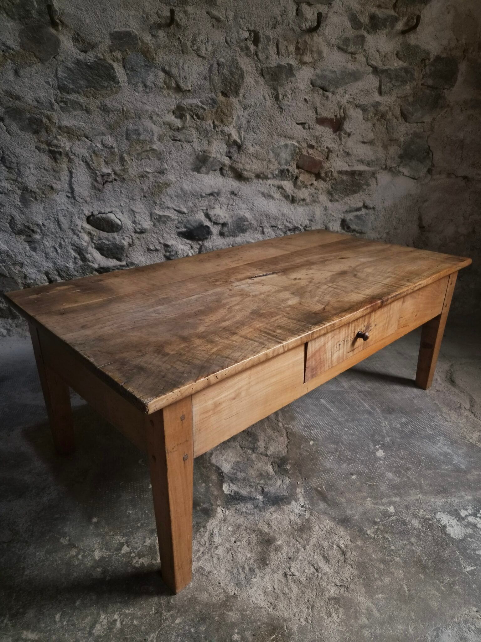 Antique French coffee table, 18th-century cherry farmhouse table with a drawer.