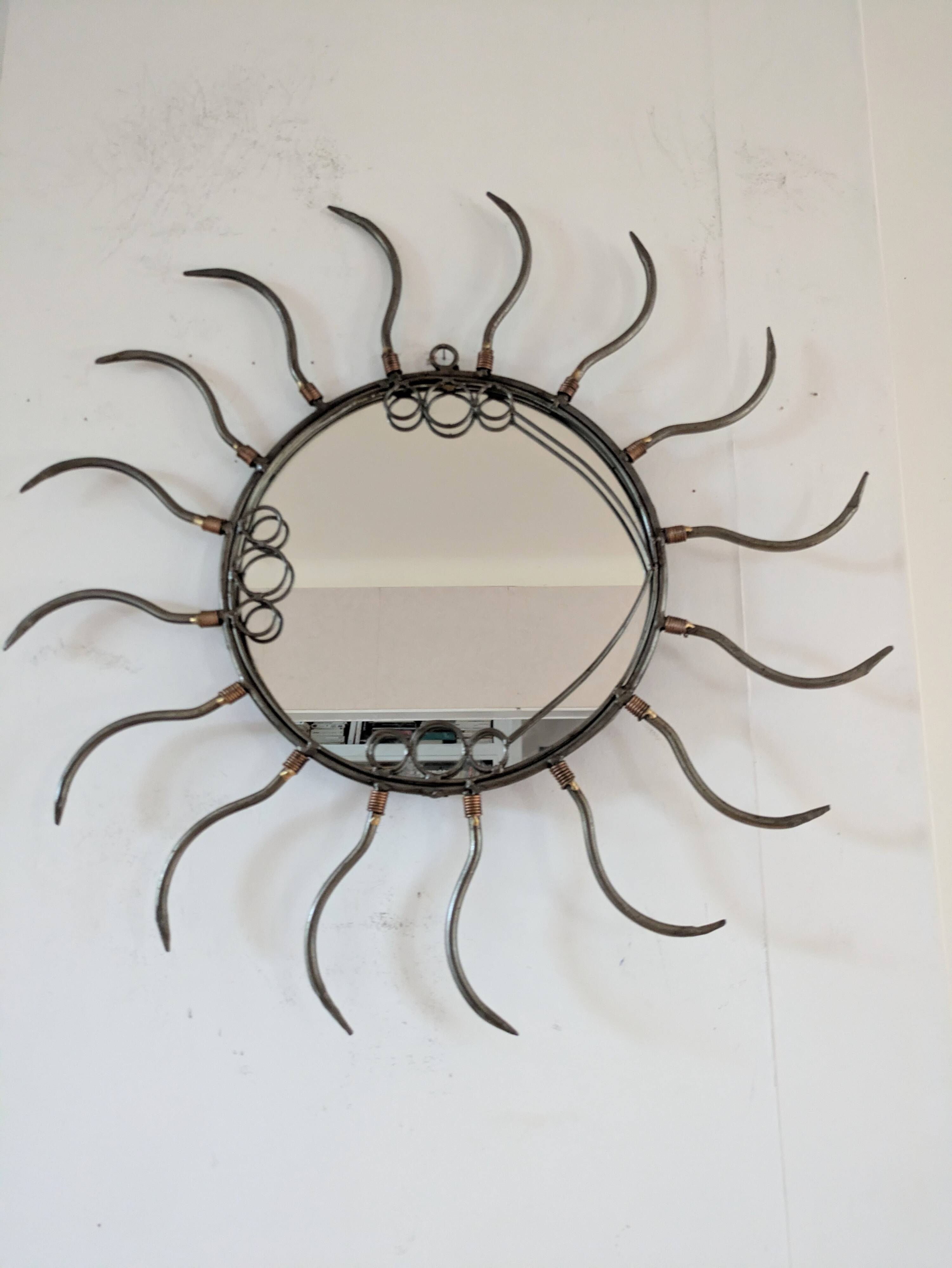 Metal sun mirror