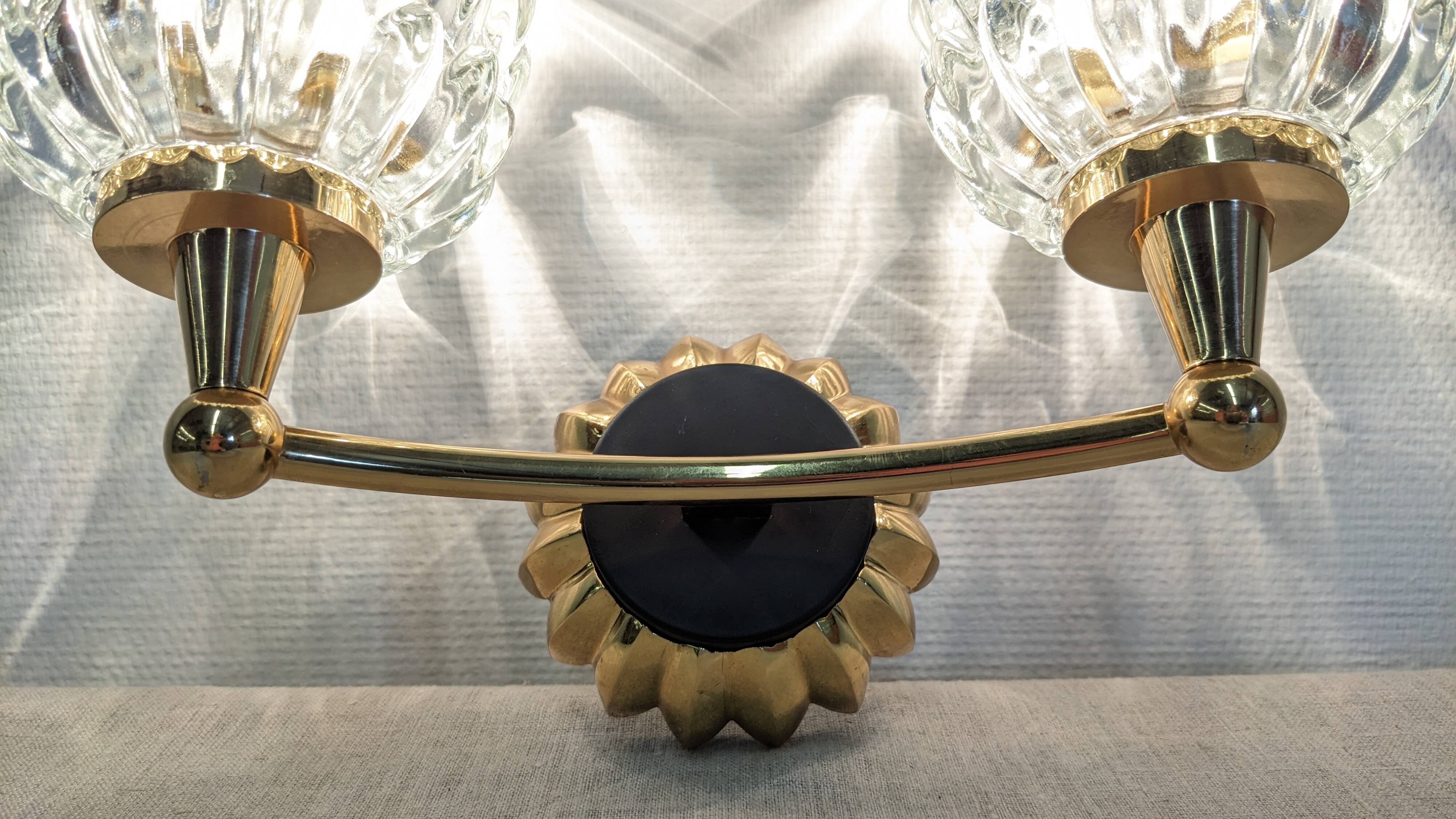 Set of 4 modernist double wall lights by Maison Arlus, France circa 1950.