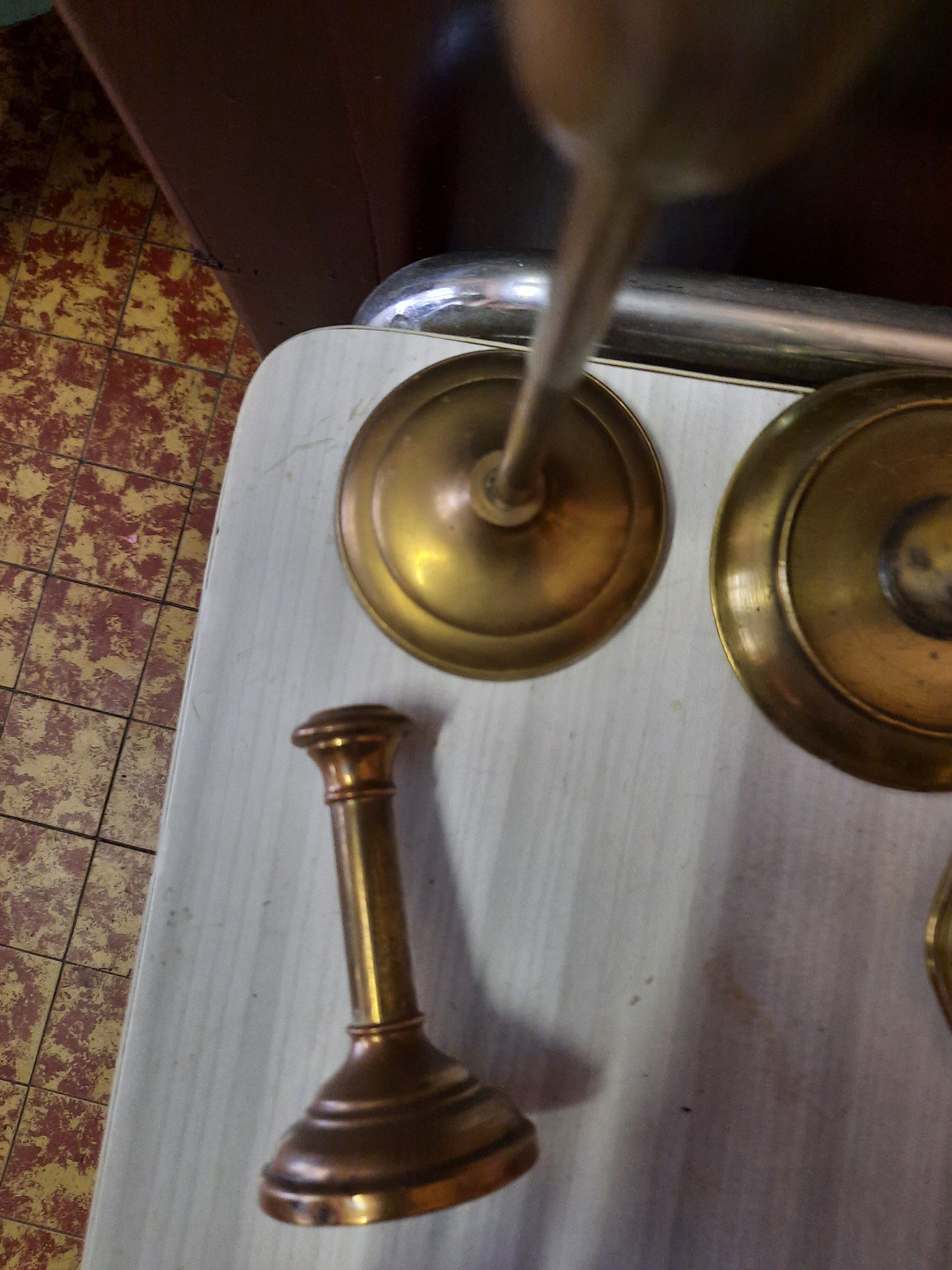 Set of brass candle holders