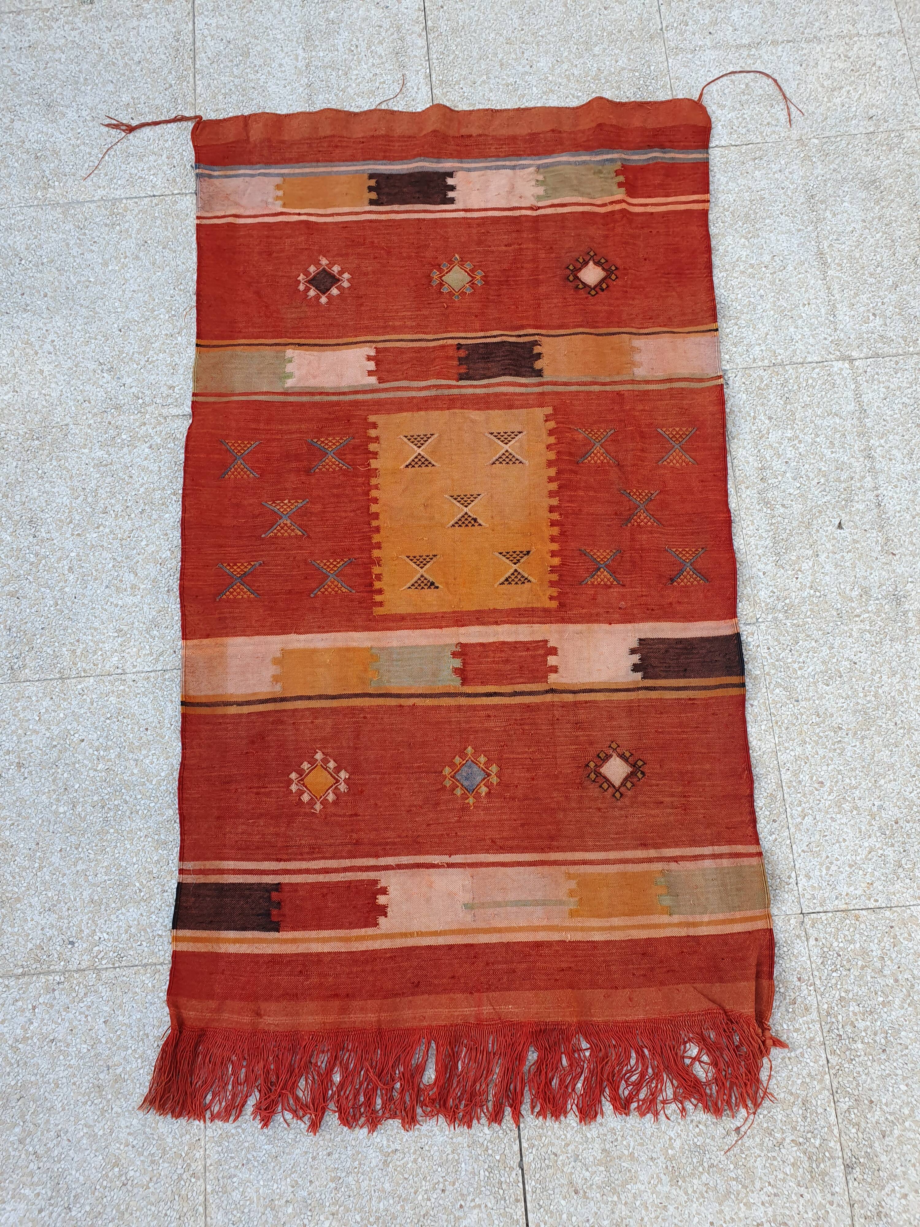 Orange red ethnic carpet 140x82 cm