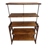 Old tilting shelf transformable into a table