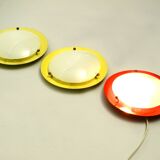 Three round 1950s wall or ceiling lamps made of metal and plexiglass shades