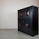 Black and red wooden brutalist bar