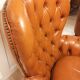 Pair of leather chesterfield chairs