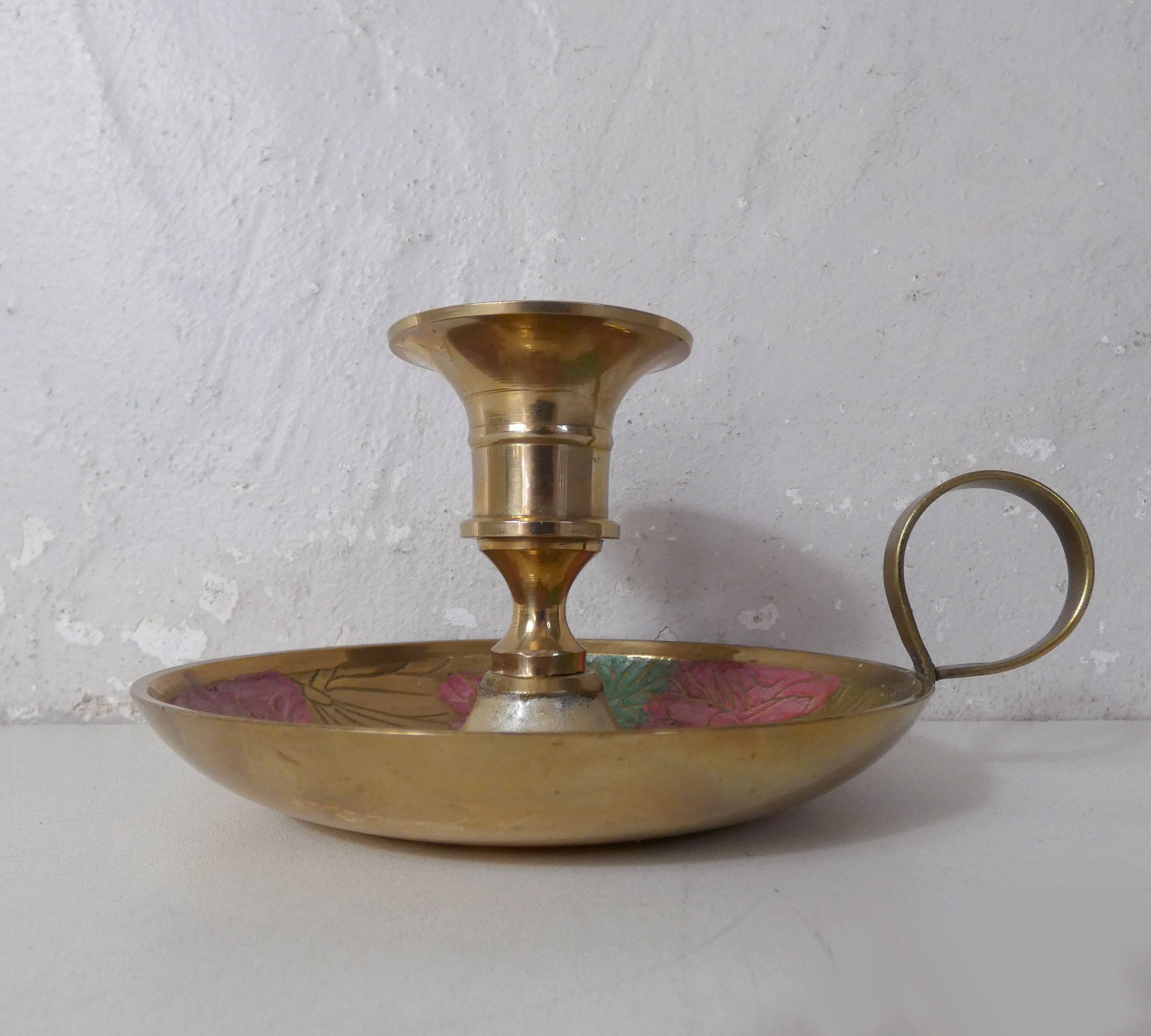Vintage enameled brass hand candle holder