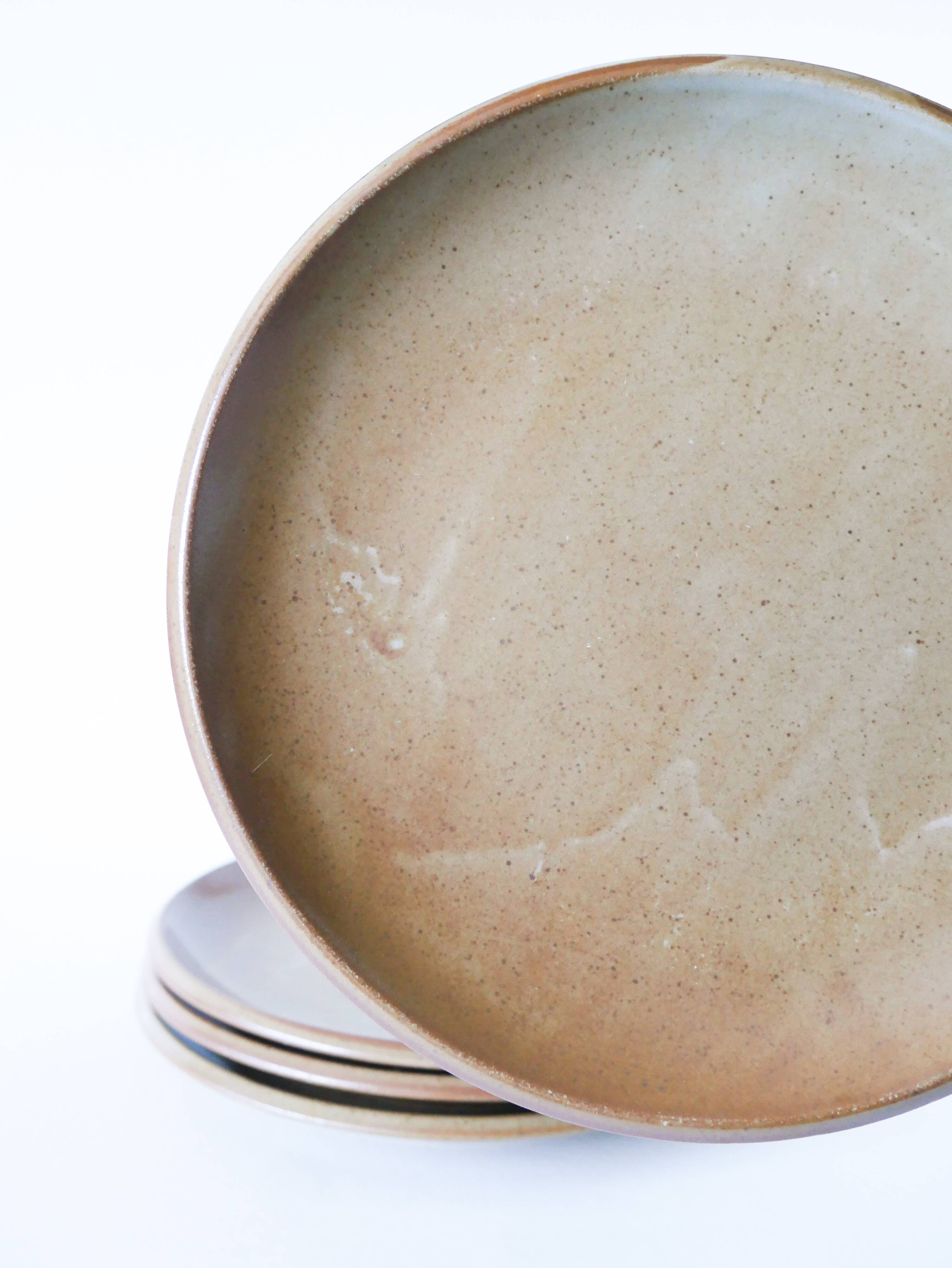 Set of 4 large flat plates in stoneware, Brenne stoneware, 1970.