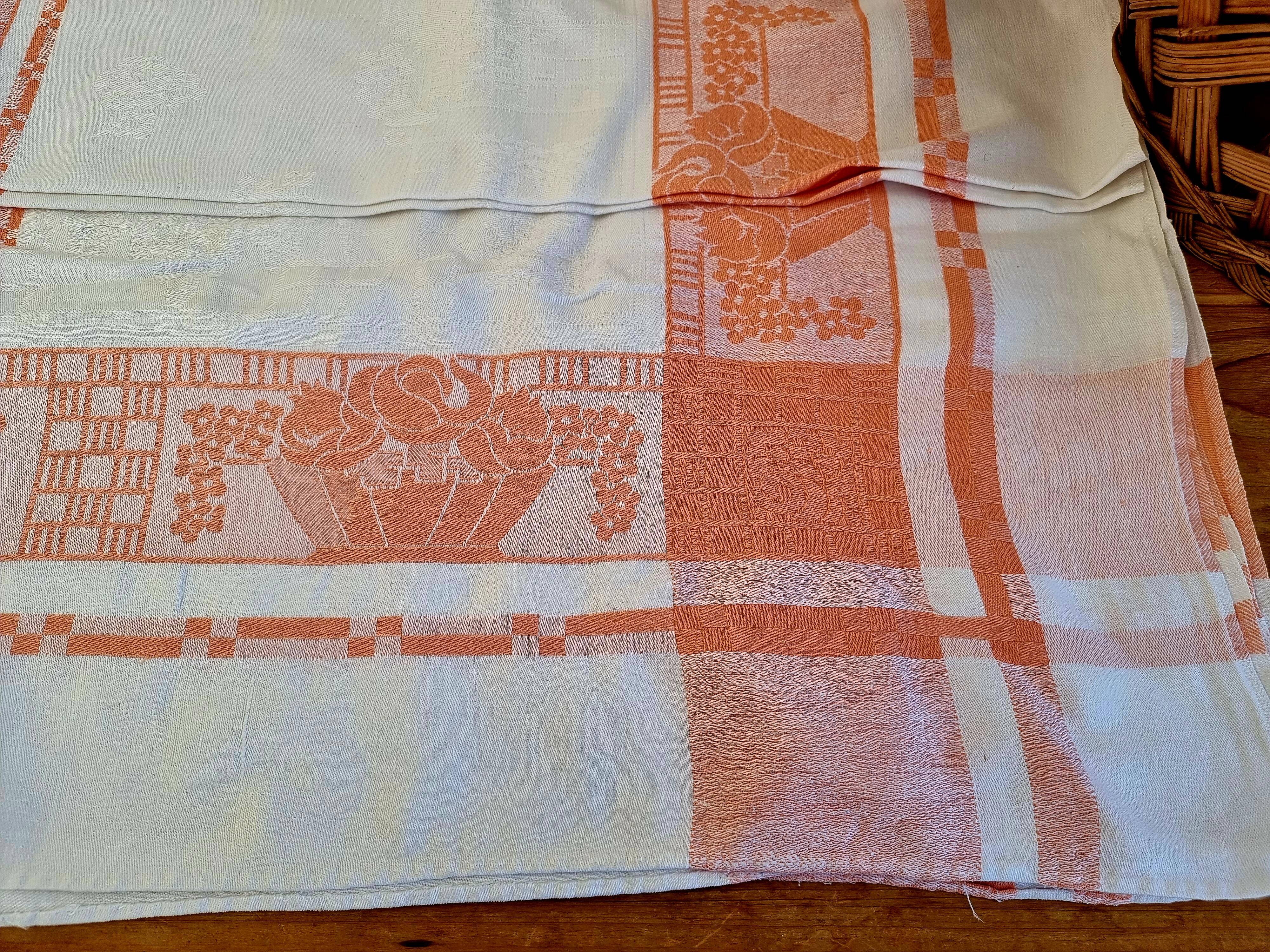 Antique orange and white damask tablecloth
