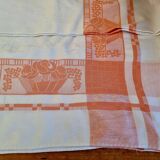 Antique orange and white damask tablecloth