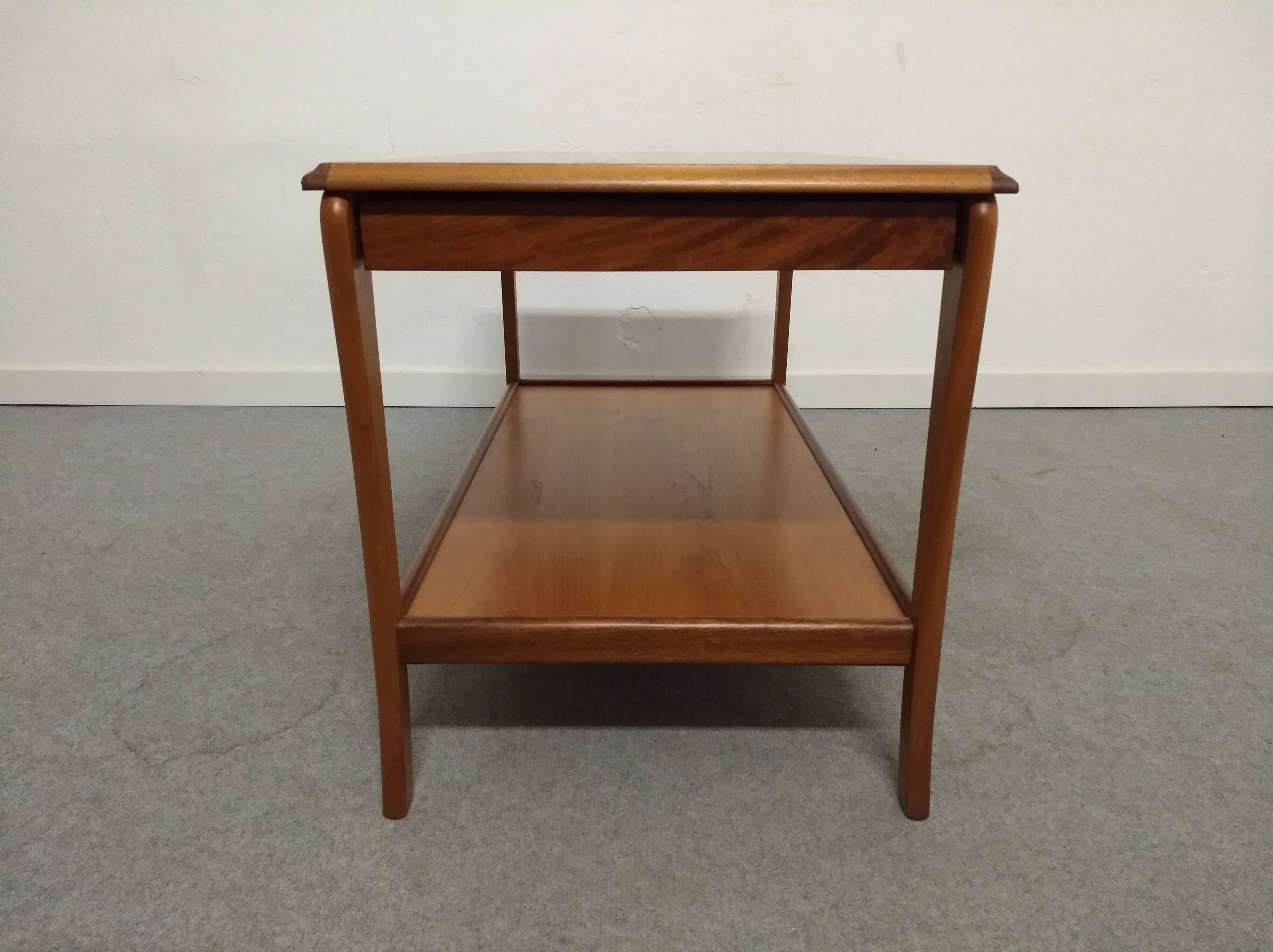Teak coffee table with vintage extensions