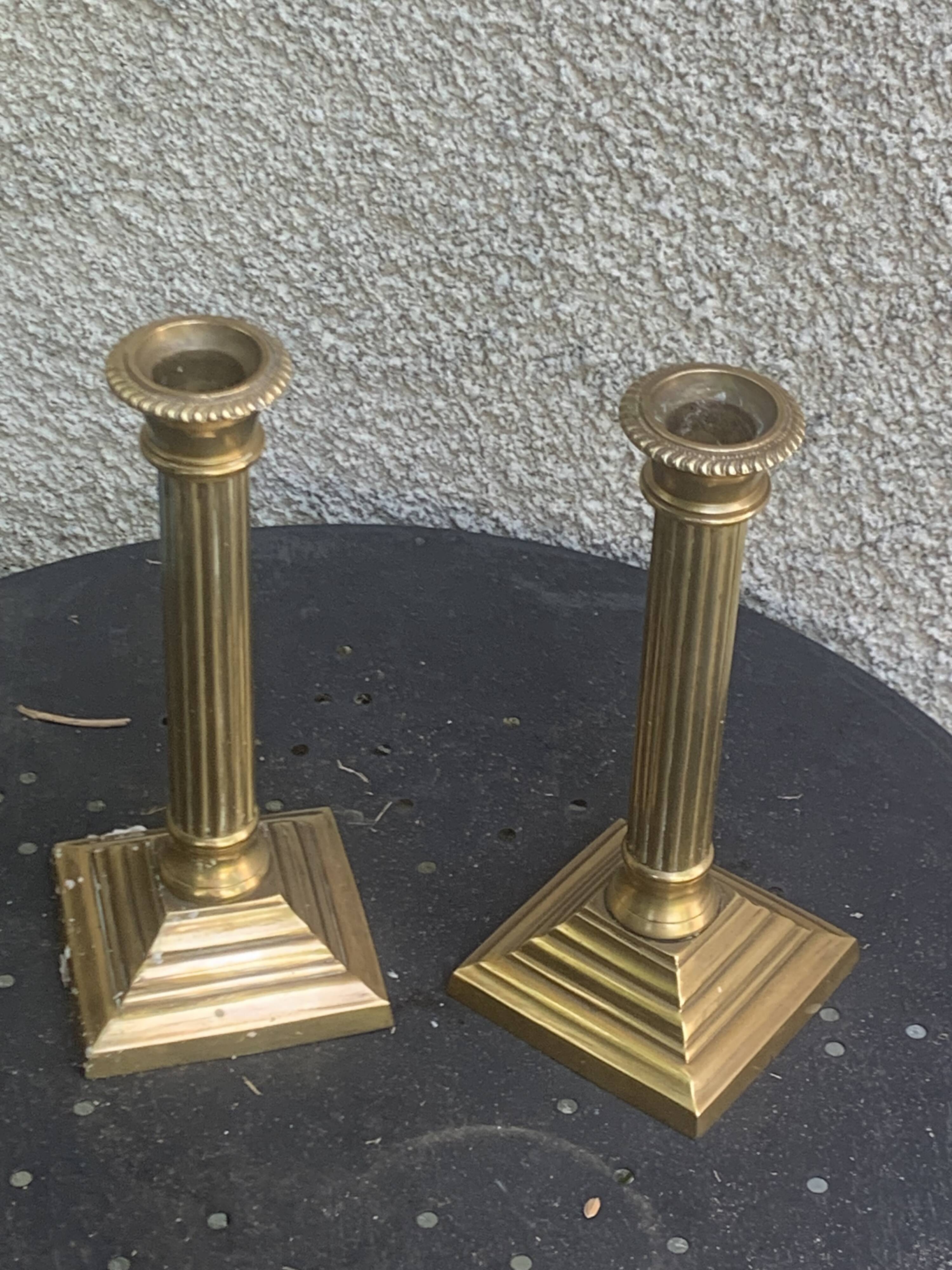 Pair of gilded brass candlesticks, vintage column shape