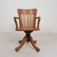 Oak office chair with adjustable spring system and height adjustment, 1950s.