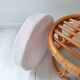 Rattan and terry fabric pouf