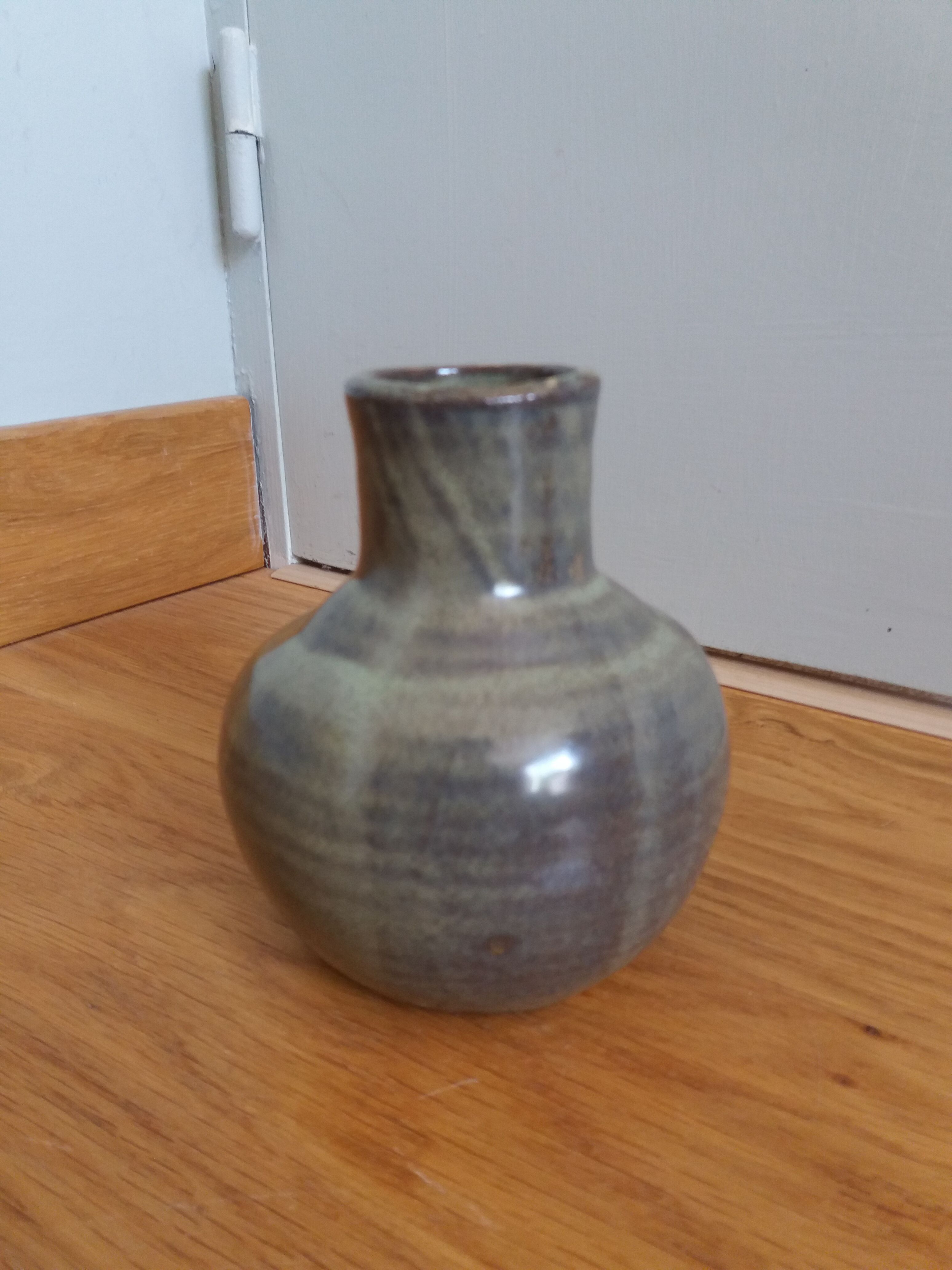 Enamelled stoneware vase signed