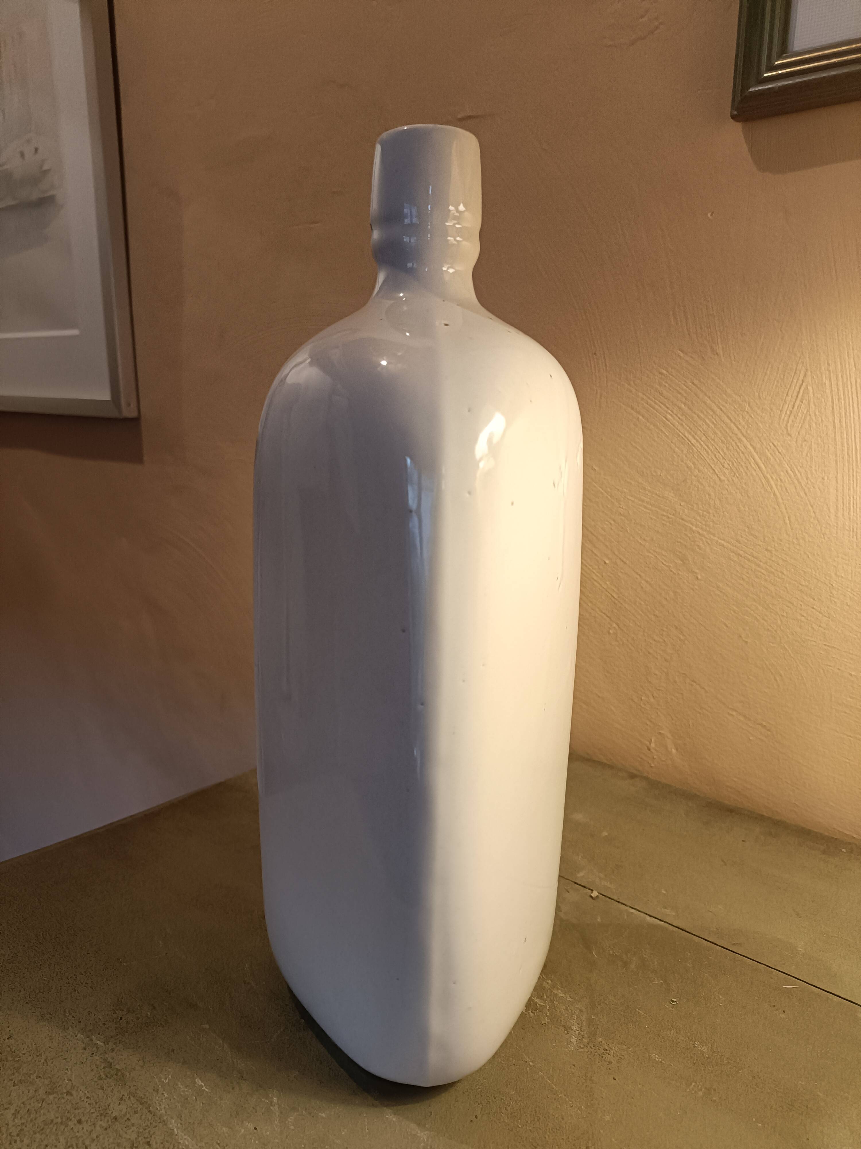 Triangular stoneware bottle