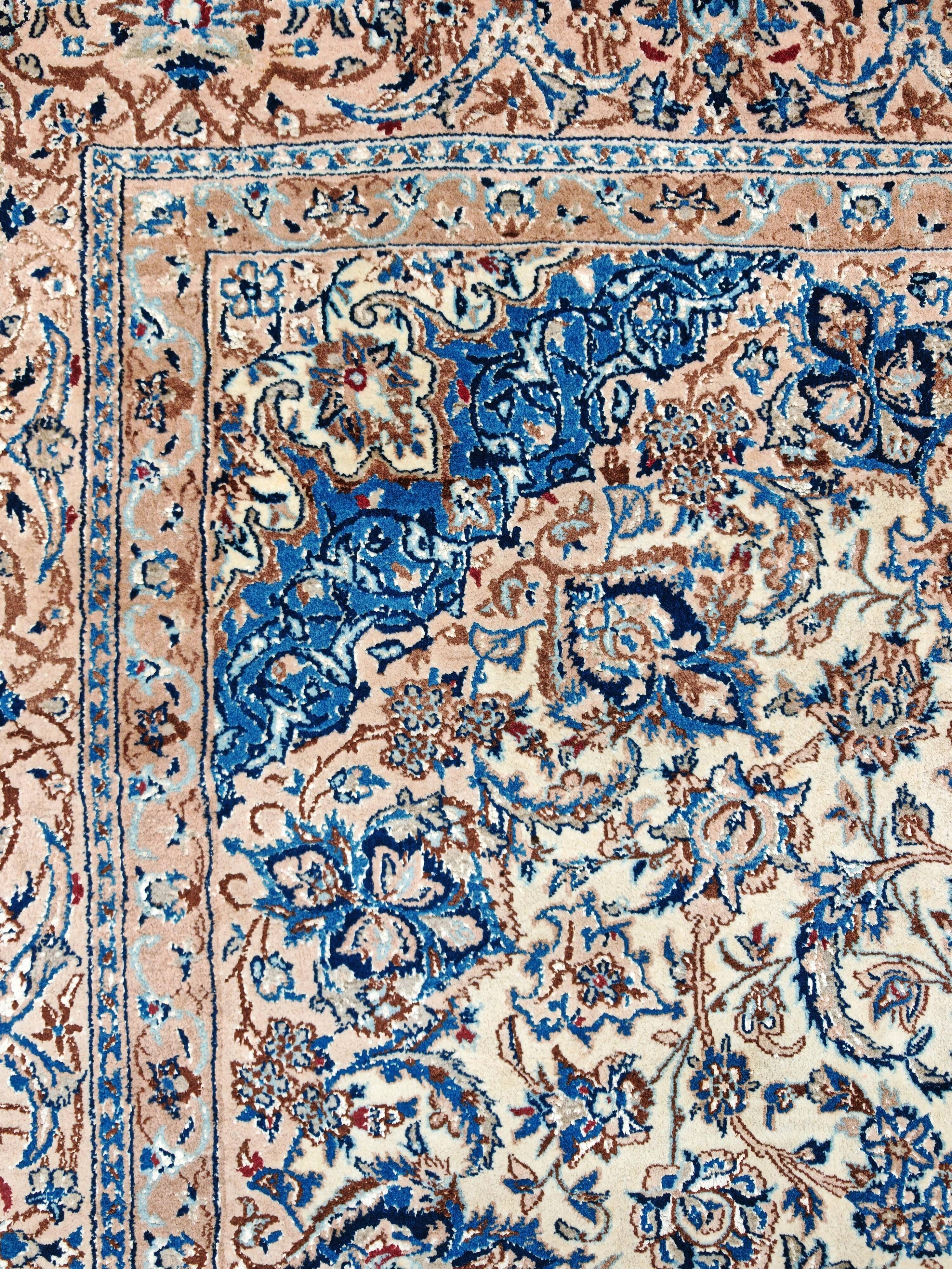Vintage Persian Nain carpet, handwoven wool and silk from the 1940s.