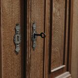 Solid oak dressmaker's cabinet with 13 drawers and 1 door
