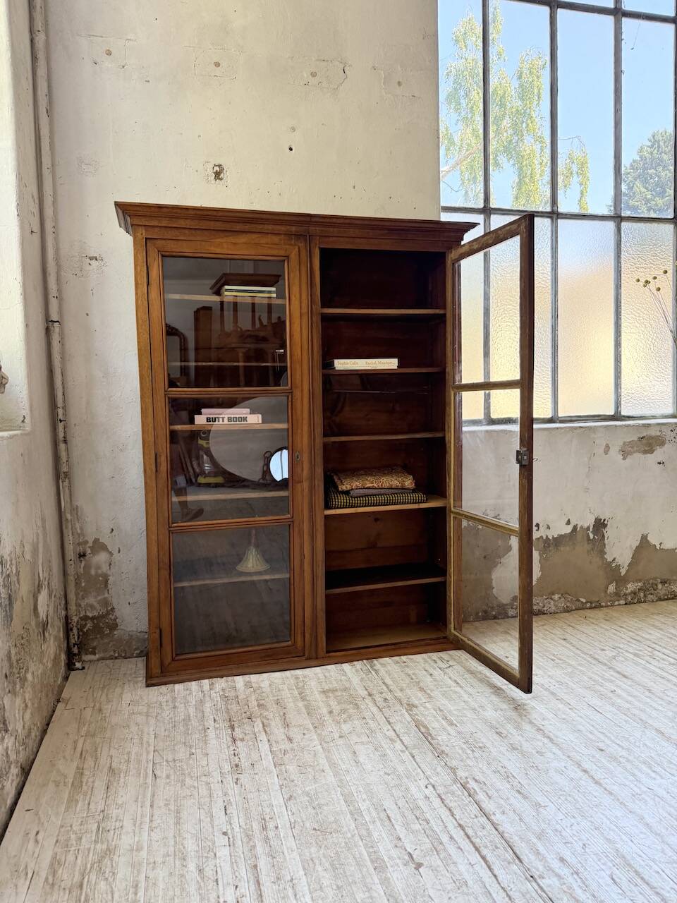 Glass-fronted walnut library 1900