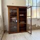 Glass-fronted walnut library 1900