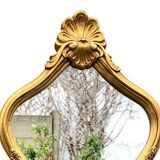 Large rococo mirror in gilded wood