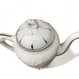 Porcelain coffee pot with floral pattern and silver stem