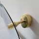 Otientable brass wall lamp and enamelled sheet metal