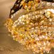 Exceptional vintage chandelier in Murano style crystal, orange, brass.