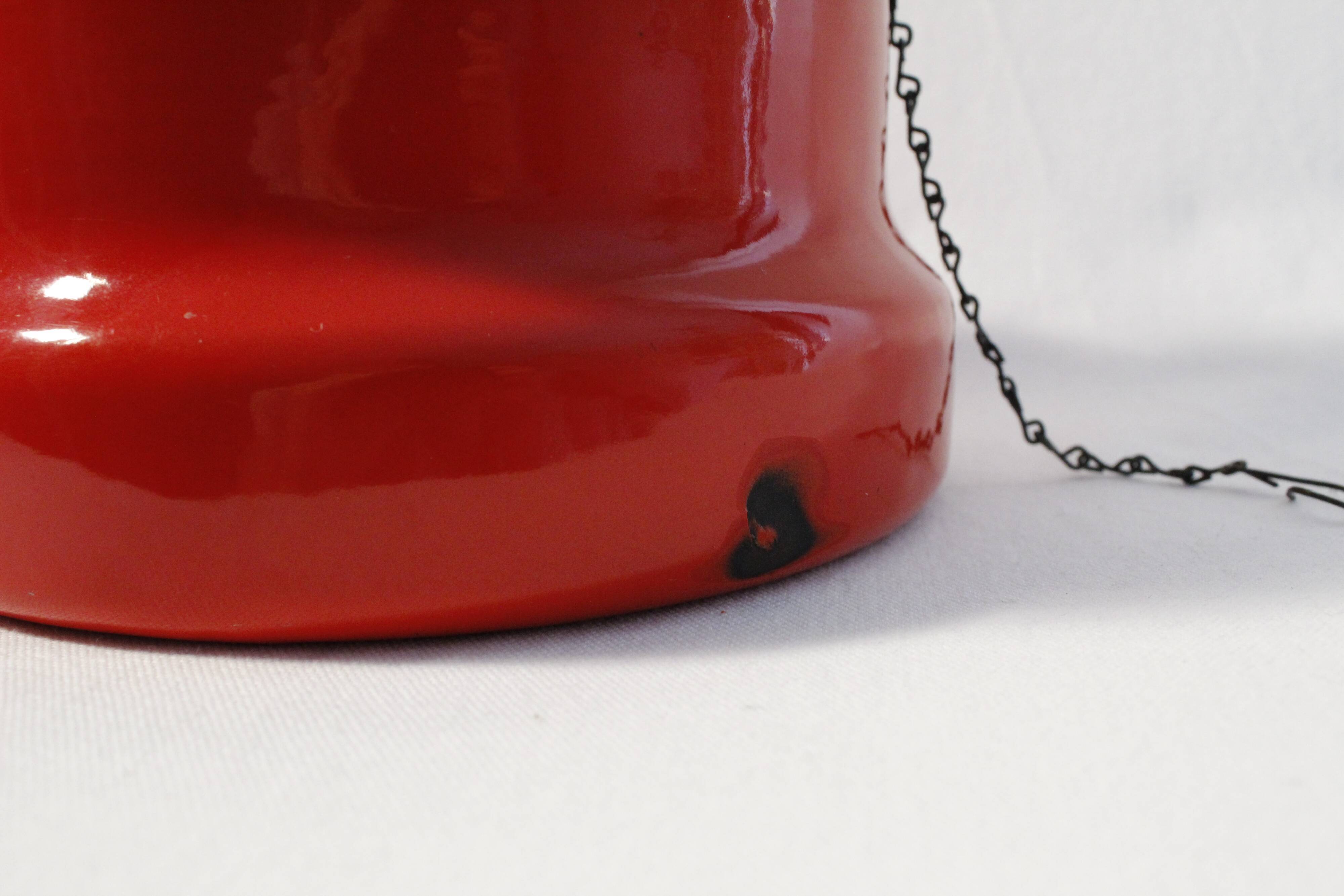 Vintage red enamelled metal kettle