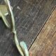 Pair of brass hooks