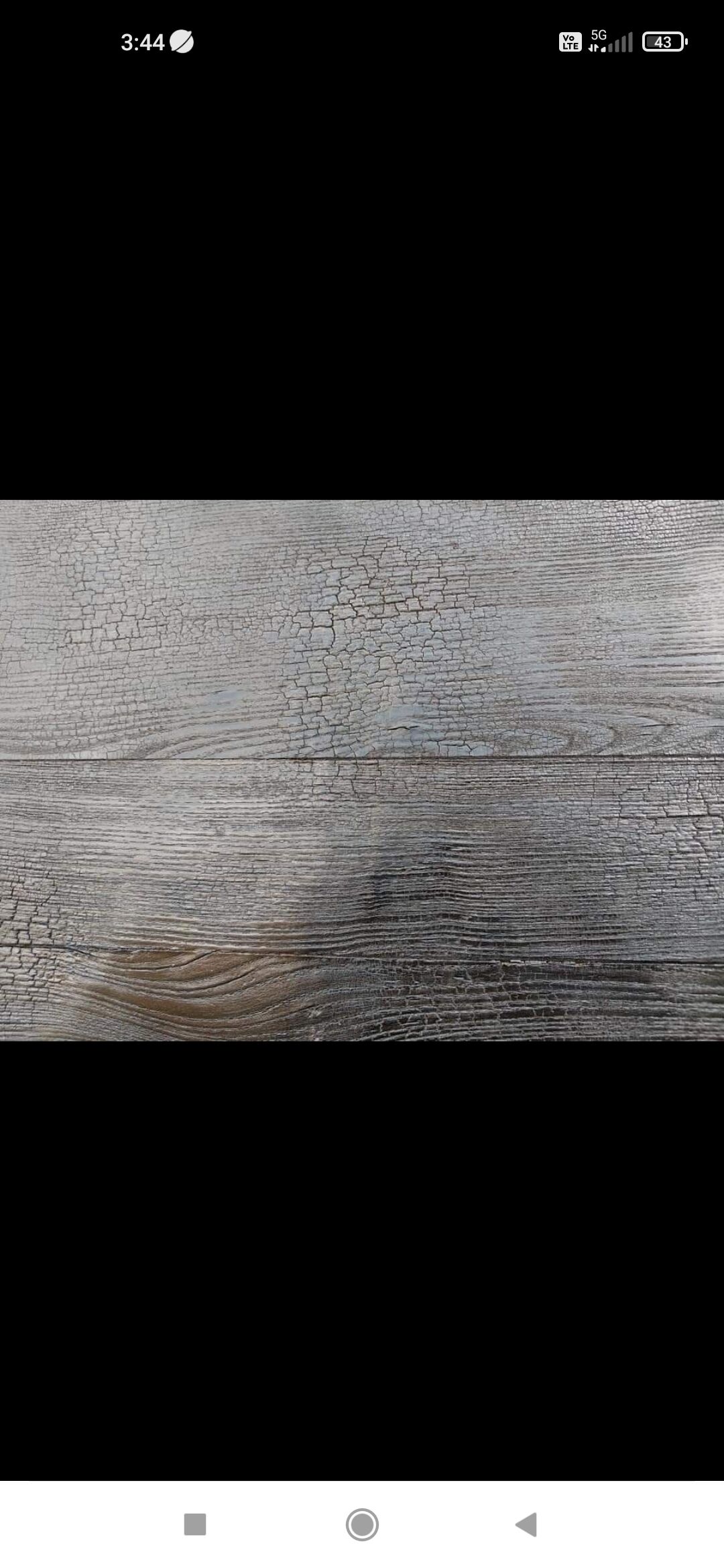 Table basse en chêne Shou Sugi Ban et piètement en étoile en aluminium
