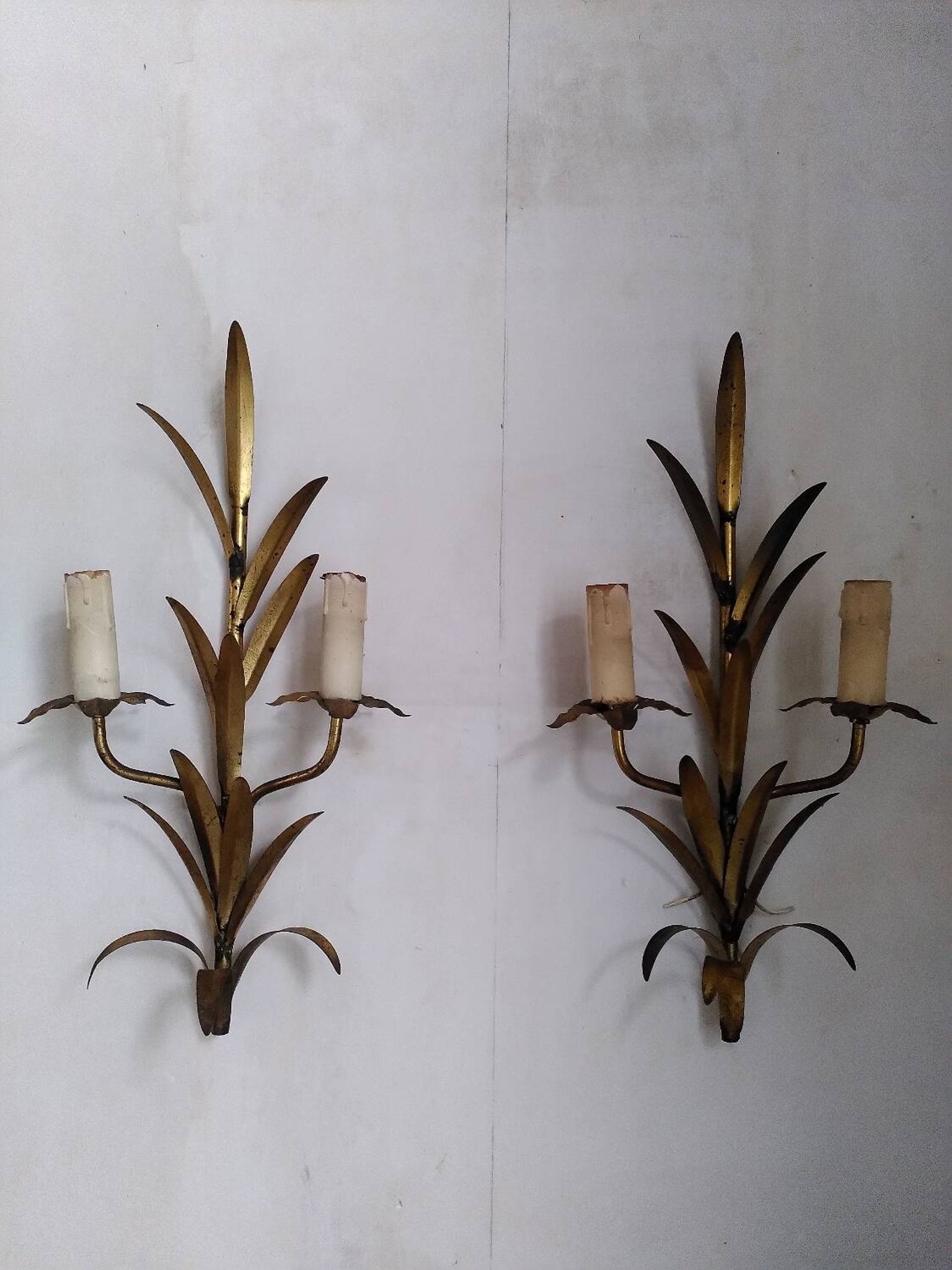 Pair of gold metal leaf wall sconces