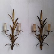 Pair of gold metal leaf wall sconces