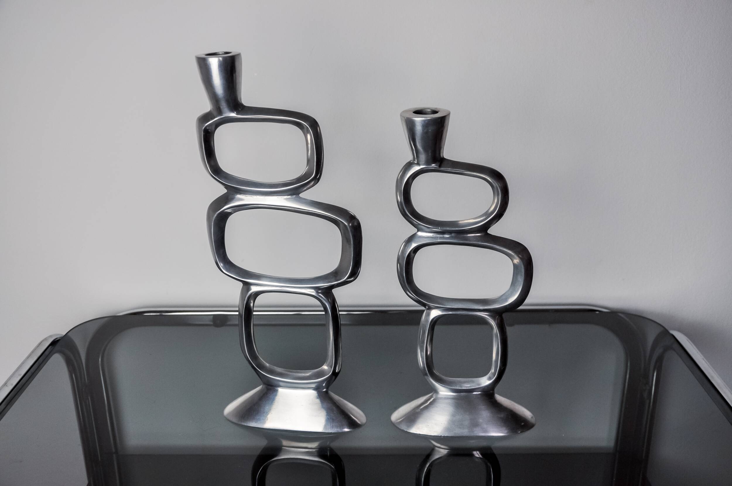 Pair of circle candlesticks by Matthew Hilton, England, 1980